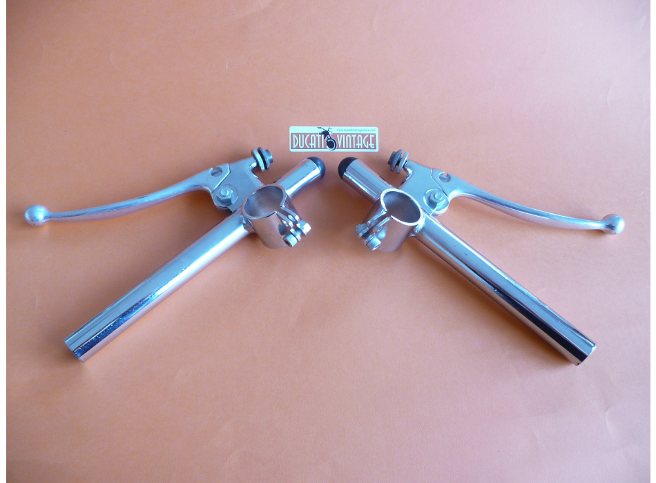 Pair of original Tommaselli clipons for fork diam. 31.5 new in excellent condition, for DUCATI bikes narrow case