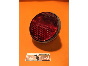 Original CEV taillight used good condition - oxidized frame and slightly scratched glass clearly visible in photo - for 250cc Scrambler America
