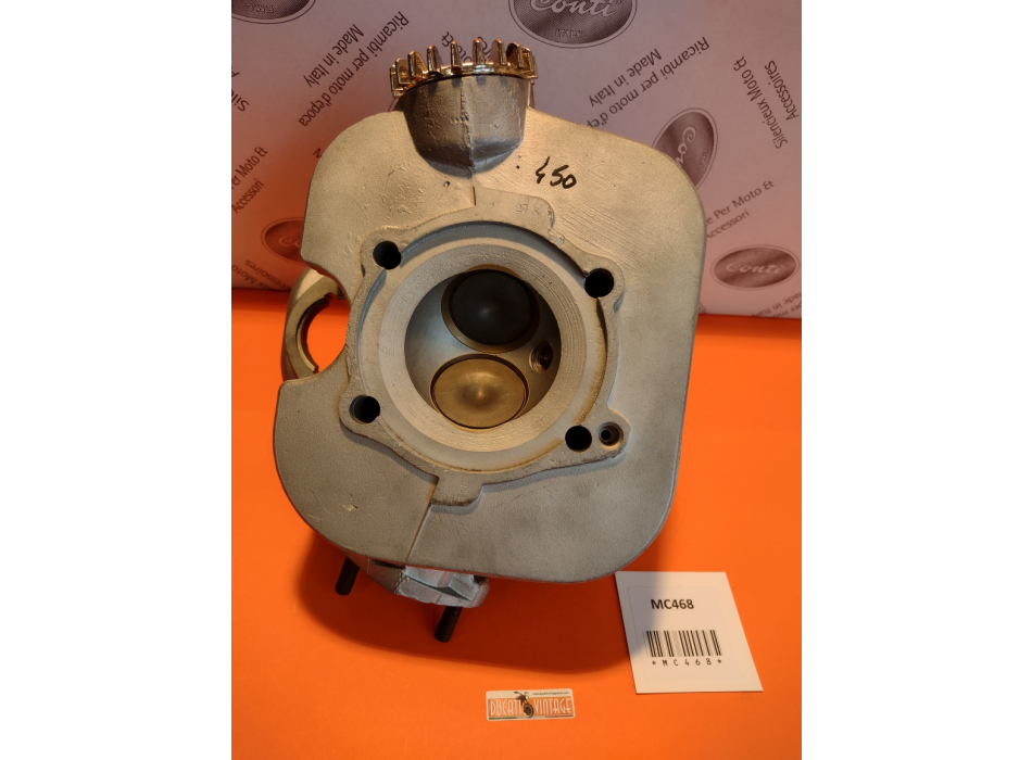 Original Ducati wide case 450cc single cylinder head in excellent condition, valve guides and new valves, exhaust ring thread excellent condition.